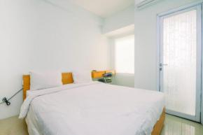 Modern Style Studio Tamansari Mahogany Karawang Apartment with City View By Travelio